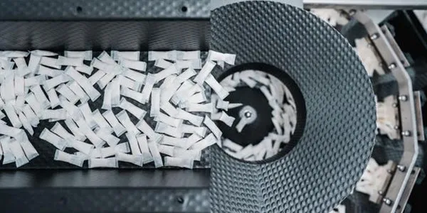 Pictures of nicotine pouch production lines