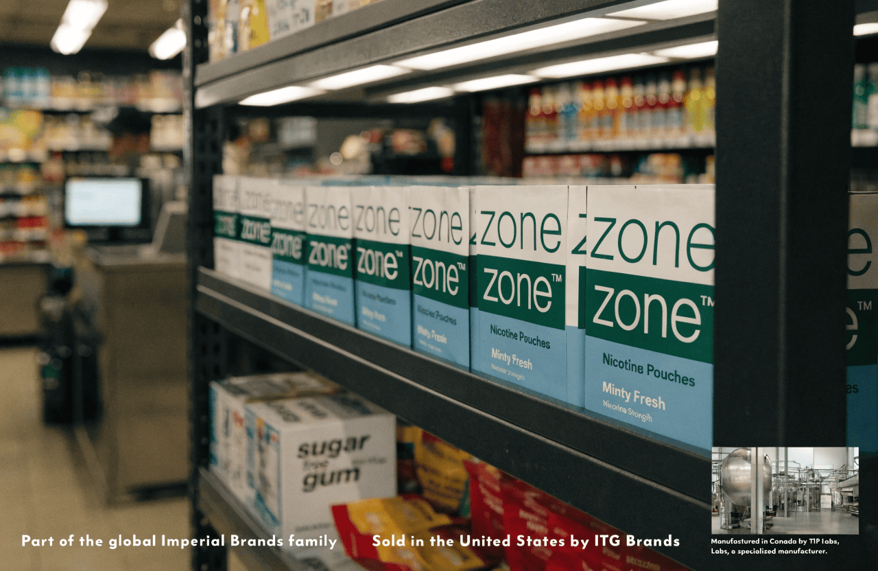 Where zone Nicotine Pouches Are Made A can of zone nicotine pouches against a backdrop of Canadian and American flags.