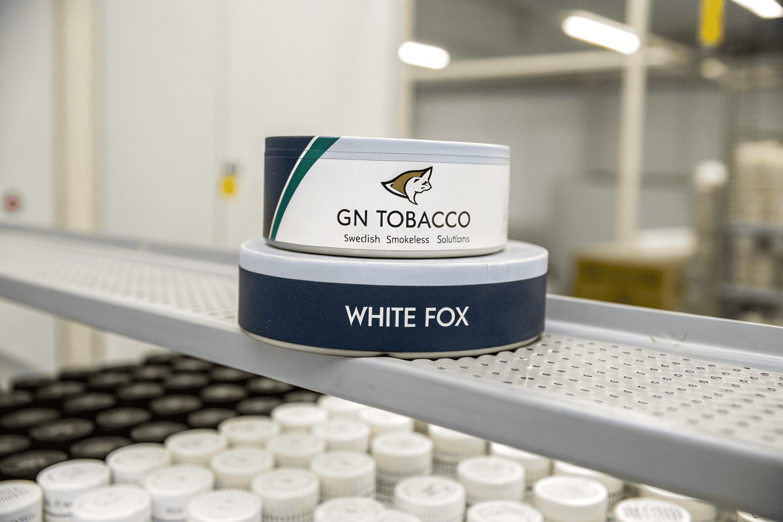 A man shrugging with a question mark over a can of White Fox pouches.